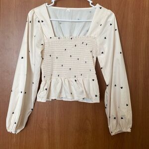 White long sleeve ruffled top